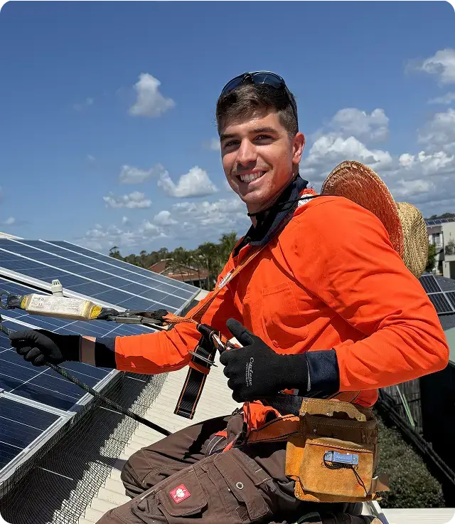 EZY Solar Cleaning technician installing bird proofing mesh around rooftop solar panels